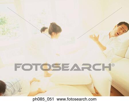 Daughter playing with father View Large Photo Image Stock Image - Daughter playing with father . Fotosearch