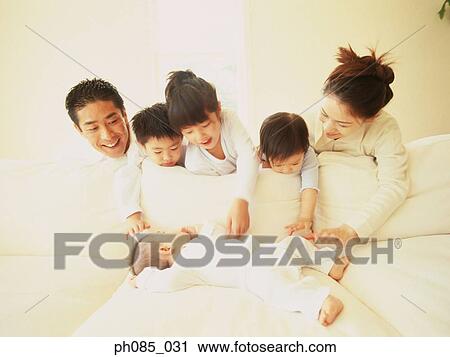 Stock Image - Portrait of a happy family. Fotosearch