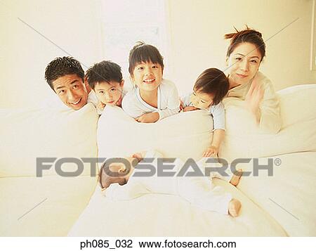 Stock Image - Portrait of a happy family. Fotosearch