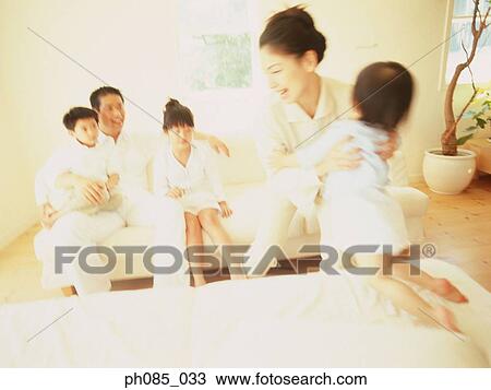 Portrait of a happy family View Large Photo Image Stock Image - Portrait of a happy family. Fotosearch