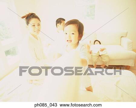 Stock Image - Portrait of a happy family. Fotosearch