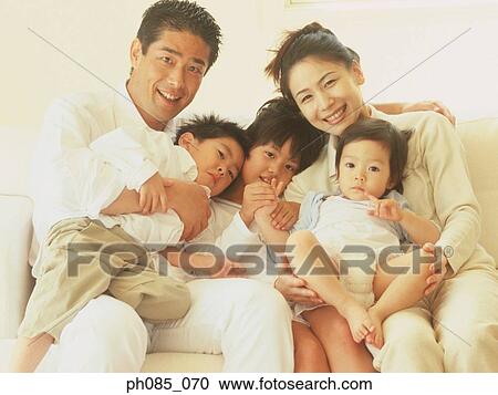 Portrait of a happy family View Large Photo Image Stock Image - Portrait of a happy family. Fotosearch