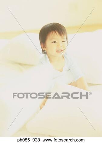Stock Photo - Portrait of a young boy. Fotosearch