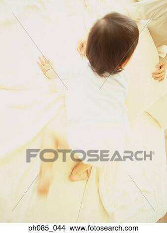 Rear view of a young boy View Large Photo Image Picture - Rear view of a young boy. Fotosearch