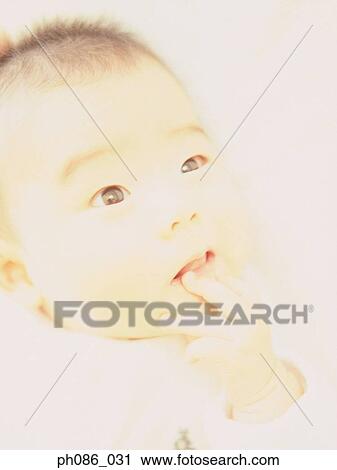 Infant lying on bed, close-up View Large Photo Image Stock Image - Infant lying on bed, close-up. Fotosearch