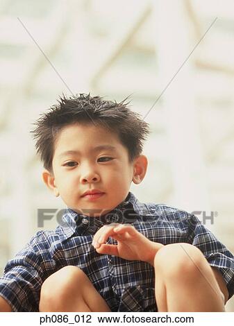 Portrait of young boy View Large Photo Image Stock Image - Portrait of young boy. Fotosearch