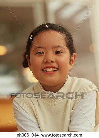 Portrait of young girl smiling View Large Photo Image Picture - Portrait of young girl smiling. Fotosearch