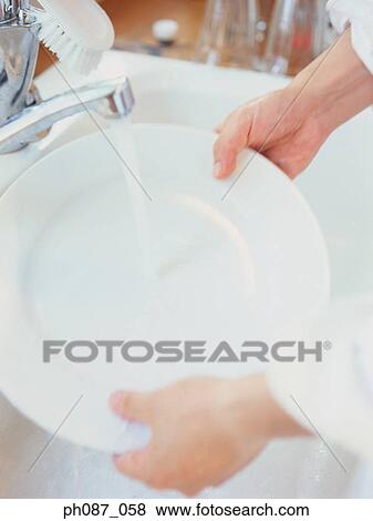 Dish washing View Large Photo Image Stock Photo - Dish washing. Fotosearch