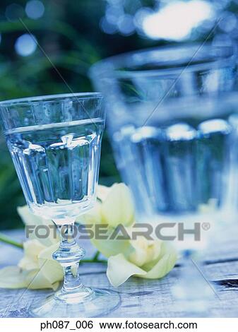 Two glasses of water, close-up View Large Photo Image Stock Photograph - Two glasses of water, close-up. Fotosearch