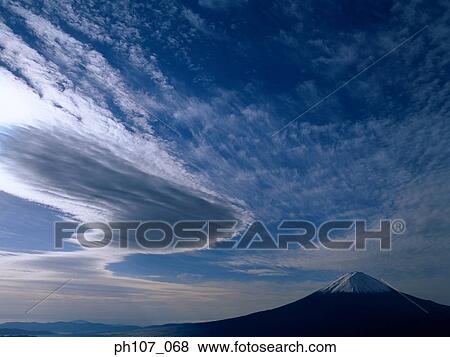 Stock Photo - Cloud overing Mt. Fuji, Japan. Fotosearch