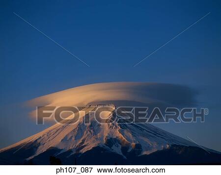 Stock Photo - Cloud overing Mt. Fuji, Japan. Fotosearch