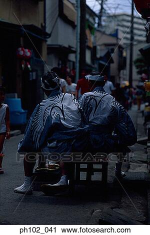 Group of Japanese men in traditional costume, rear view View Large Photo Image Stock Image - Group of Japanese men in traditional costume, rear view. Fotosearch