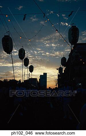 Japanese festival ritual at sunset View Large Photo Image Stock Photograph - Japanese festival ritual at sunset. Fotosearch