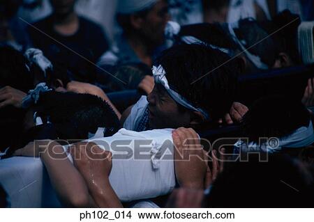 Japanese men in a festival ritual View Large Photo Image Picture - Japanese men in a festival ritual. Fotosearch