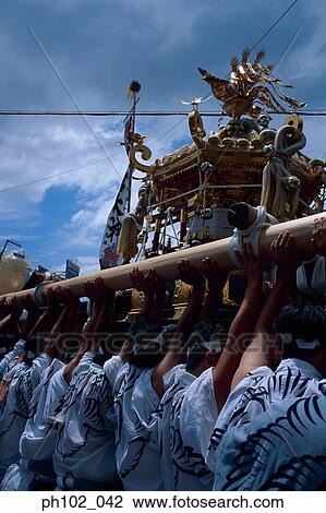 Japanese men in a festival ritual View Large Photo Image Stock Image - Japanese men in a festival ritual. Fotosearch