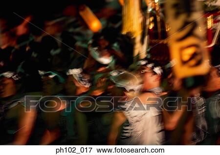Japanese men in a festival ritual View Large Photo Image Stock Photo - Japanese men in a festival ritual. Fotosearch