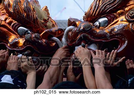Stock Photography - Japanese men in a festival ritual. Fotosearch