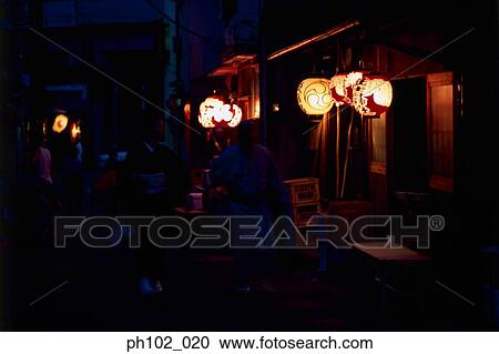 Stock Image - Matured man and woman in traditional Japanese costume. Fotosearch