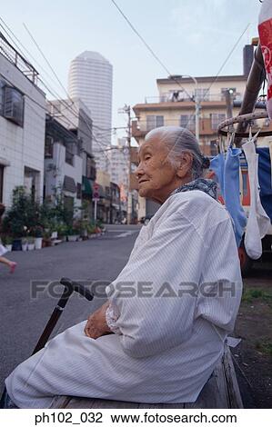 Stock Image - Portrait of a matured Japanese woman. Fotosearch