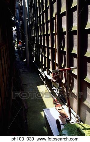 Stock Photo - A narrow alley. Fotosearch