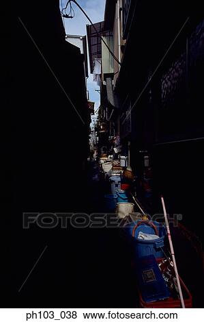 Back lane congested with plastic pails View Large Photo Image Stock Photo - Back lane congested with plastic pails. Fotosearch
