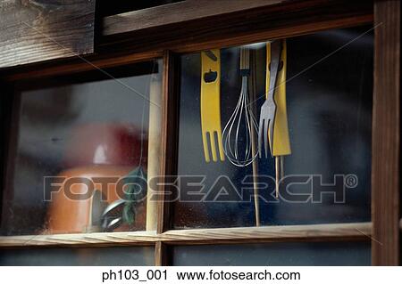 Window with hanging utensils View Large Photo Image Stock Image - Window with hanging utensils. Fotosearch