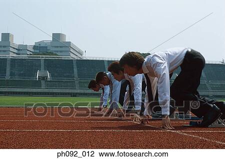 Businessmen at starting line View Large Photo Image Stock Image - Businessmen at starting line . Fotosearch