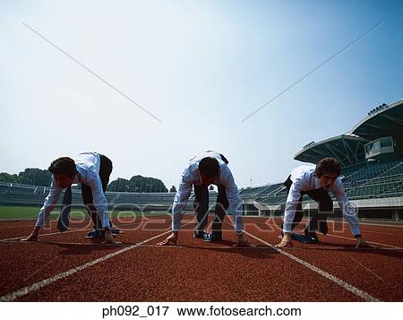Businessmen at starting line View Large Photo Image Stock Photo - Businessmen at starting line . Fotosearch
