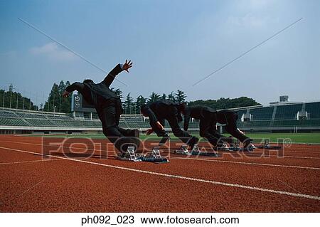 Businessmen leaving starting block View Large Photo Image Stock Image - Businessmen leaving starting block . Fotosearch
