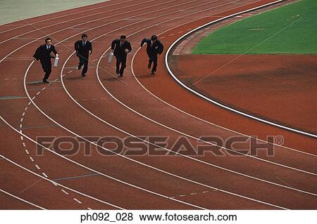 Businessmen sprinting, carrying briefcases View Large Photo Image Stock Photo - Businessmen sprinting, carrying briefcases. Fotosearch
