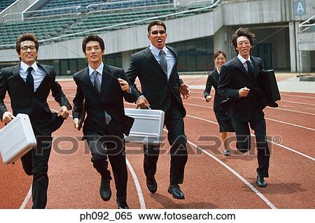 Businesspeople running on stadium track, carrying briefcases View Large Photo Image Stock Photography - Businesspeople running on stadium track, carrying briefcases. Fotosearch