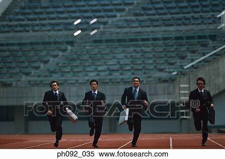 Businesspeople sprinting, carrying briefcases View Large Photo Image Stock Photography - Businesspeople sprinting, carrying briefcases. Fotosearch