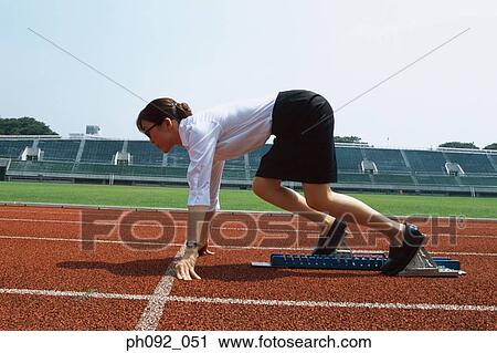 Businesswoman at starting block View Large Photo Image Stock Image - Businesswoman at starting block . Fotosearch