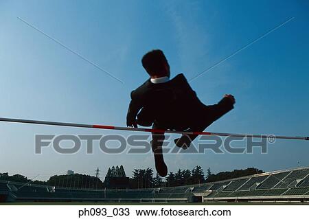 Businessman high-jumping View Large Photo Image Stock Image - Businessman high-jumping . Fotosearch