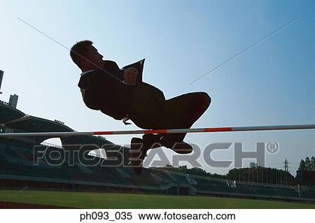 Businessman high-jumping View Large Photo Image Stock Photography - Businessman high-jumping . Fotosearch