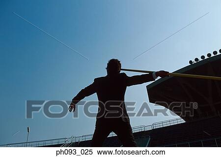 Businessman throwing a javelin, silhouette View Large Photo Image Stock Photography - Businessman throwing a javelin, silhouette. Fotosearch