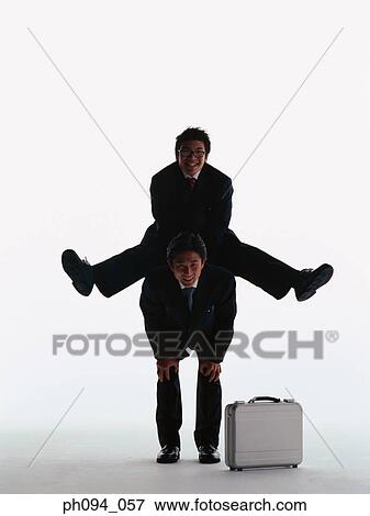Businessmen leap-frogging View Large Photo Image Stock Photo - Businessmen leap-frogging. Fotosearch