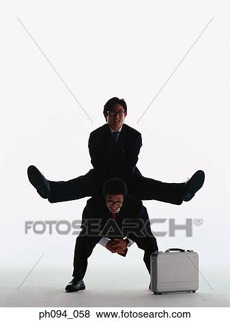Businessmen leap-frogging View Large Photo Image Stock Photo - Businessmen leap-frogging. Fotosearch