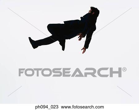 Young businessman leaping in air View Large Photo Image Stock Image - Young businessman leaping in air. Fotosearch