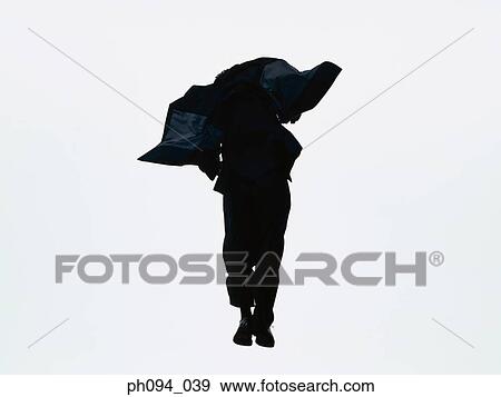 Young businessman leaping in air View Large Photo Image Stock Photo - Young businessman leaping in air. Fotosearch
