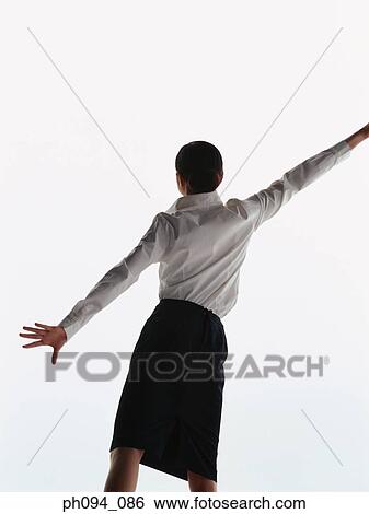 Young businesswoman in dancing posture View Large Photo Image Stock Photograph - Young businesswoman in dancing posture. Fotosearch
