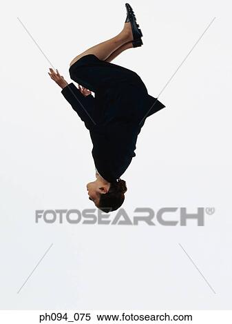 Young businesswoman leaping in air View Large Photo Image Stock Photography - Young businesswoman leaping in air. Fotosearch