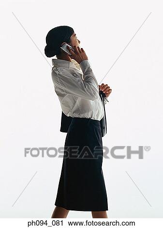 Young businesswoman with cell phone View Large Photo Image Stock Image - Young businesswoman with cell phone. Fotosearch
