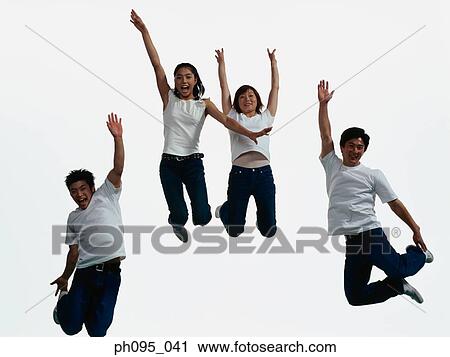 Group of friends in jeans and t-shirts, jumping in mid-air View Large Photo Image Stock Image - Group of friends in jeans and t-shirts, jumping in mid-air. Fotosearch