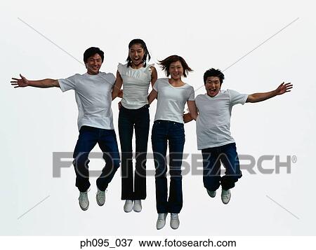Group of friends in jeans and t-shirts, jumping in mid-air View Large Photo Image Stock Photo - Group of friends in jeans and t-shirts, jumping in mid-air. Fotosearch