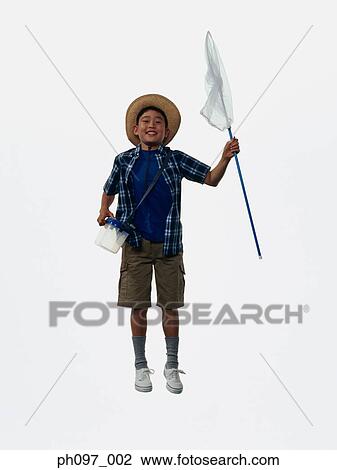 Young Asian boy with butterfly net, jumping in mid-air View Large Photo Image Stock Image - Young Asian boy with butterfly net, jumping in mid-air. Fotosearch