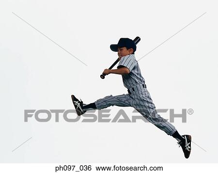 Stock Photograph - Young Baseball player holding bat in mid-air. Fotosearch