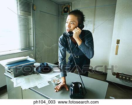 Man on the phone, hand holding cigarette View Large Photo Image Stock Image - Man on the phone, hand holding cigarette. Fotosearch