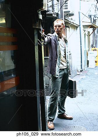 Portrait of a man standing View Large Photo Image Stock Photo - Portrait of a man standing. Fotosearch