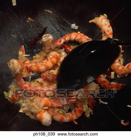 Fried prawns in wok View Large Photo Image Stock Photo - Fried prawns in wok. Fotosearch